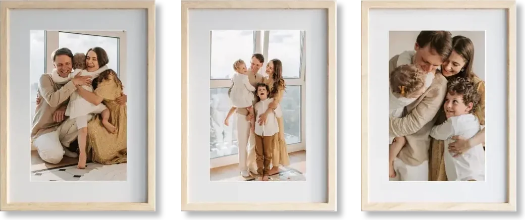 Three framed family photographs